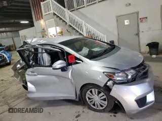 2015 Honda Fit LX with VIN 3HGGK5H53FM748495, listed as a Copart auction lot 86590994 with 124,000 mi miles and Salvage Title. Bid and sale history available at carsss.com. Image 4.