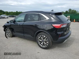 2021 Ford Escape Titanium with VIN 1FMCU9J97MUA57521, listed as a Copart auction lot 58714055 with 83,201 mi miles and Salvage title. Bid and sale history available at DreamBid. Image 2.