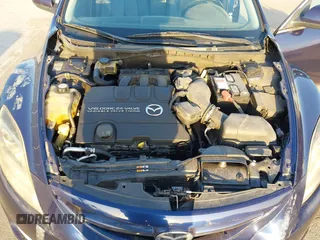 2009 Mazda 6 S Grand Touring with VIN 1YVHP82BX95M21357, listed as a IAAI auction lot 42013043 with 119,701 mi miles and . Bid and sale history available at DreamBid. Image 10.