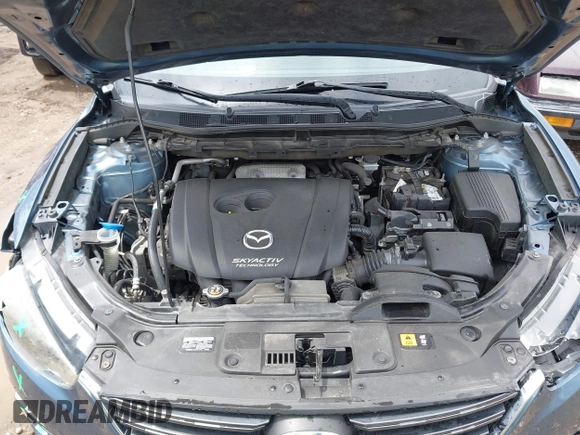 2016 Mazda CX-5 Touring z VIN JM3KE2CY3G0728968, wystawiony jako IAAI lot #42189174 z przebiegiem 145 977 mil mil oraz . Historia ofert i sprzedaży dostępna na DreamBid. Obrazek 10.