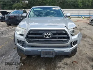 2016 Toyota Tacoma SR5 with VIN 5TFAX5GN3GX073301, listed as a Copart auction lot 71953054 with 148,396 mi miles and Salvage Title. Bid and sale history available at carsss.com. Image 5.