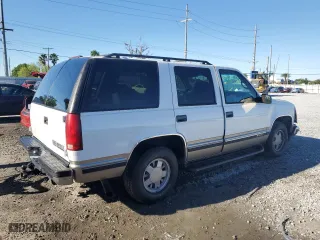 1998 Chevrolet Tahoe with VIN 1GNEC13R3WJ321117, listed as a Copart auction lot 49324525 with 1,548,503 mi miles and Salvage Title. Bid and sale history available at carsss.com. Image 3.
