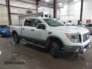 2017 Nissan Titan XD PRO-4X with VIN 1N6BA1F42HN515535, listed as a IAAI auction lot 41770534 with 73,733 mi miles. Bid and sale history available at carsss.com. Image 1.