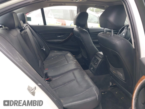 2014 BMW 3 Series 320i xDrive with VIN WBA3C3C52EP661389, listed as a IAAI auction lot 42160042 with 131,997 mi miles and . Bid and sale history available at DreamBid. Image 8.