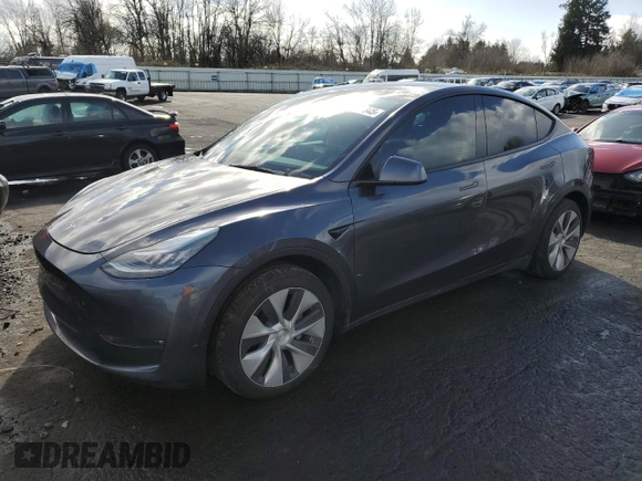 2021 Tesla Model Y Long Range with VIN 5YJYGAEE4MF200914, listed as a Copart auction lot 46946845 with 116,370 mi miles and Salvage Title. Bid and sale history available at DreamBid. Image 1.