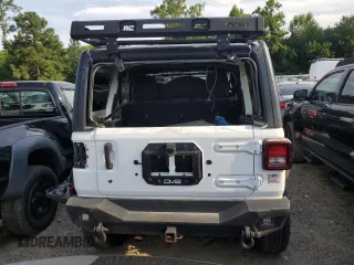 2018 Jeep Wrangler Unlimited Sport S with VIN 1C4HJXDGXJW130690, listed as a Copart auction lot 46921725 with 107,616 mi miles and Salvage title. Bid and sale history available at DreamBid. Image 6.