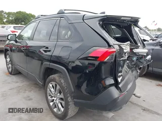 2022 Toyota RAV4 XLE Premium with VIN JTMC1RFV0ND085813, listed as a IAAI auction lot 42152401 with 86,707 mi miles and . Bid and sale history available at DreamBid. Image 3.