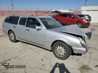1999 Mercedes-Benz E-Class with VIN WDBJH65F7XA873728, listed as a Copart auction lot 71123304 with 0 mi miles and Salvage Title. Bid and sale history available at carsss.com. Image 4.