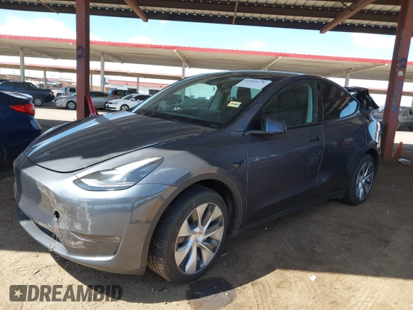2023 Tesla Model Y Long Range with VIN 7SAYGDEE4PF875915, listed as a IAAI auction lot 42095178 with 11,928 mi miles and . Bid and sale history available at DreamBid. Image 19.