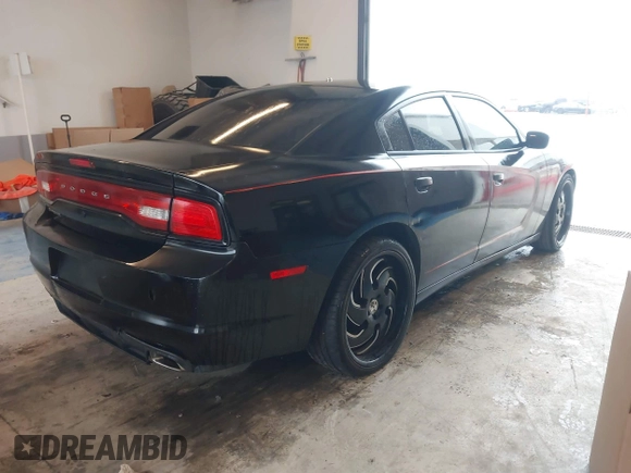 2012 Dodge Charger Police with VIN 2C3CDXAG3CH305132, listed as a IAAI auction lot 41555619 with 128,777 mi miles. Bid and sale history available at carsss.com. Image 4.