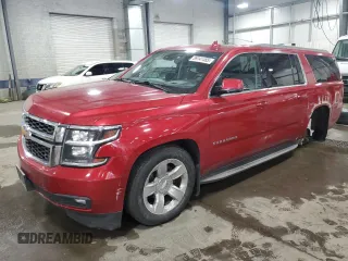 2015 Chevrolet Suburban LT with VIN 1GNSKJKC9FR582062, listed as a Copart auction lot 59141485 with 189,184 mi miles and Salvage title. Bid and sale history available at DreamBid. Image 1.