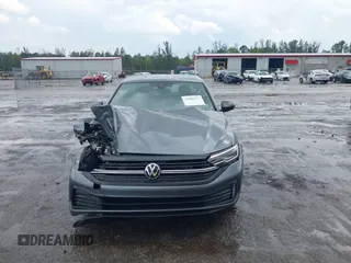 2023 Volkswagen Jetta Sport with VIN 3VWBM7BU8PM005151, listed as a IAAI auction lot 41886412 with 23,351 mi miles and . Bid and sale history available at DreamBid. Image 12.