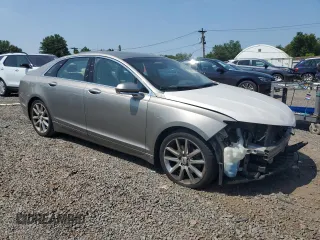 2016 Lincoln MKZ z VIN 3LN6L2J99GR620863, wystawiony jako Copart lot #59547725 z przebiegiem 121 607 mil mil oraz Szkoda całkowita • Salvage title. Historia ofert i sprzedaży dostępna na DreamBid. Obrazek 4.
