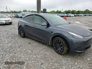 2022 Tesla Model Y Performance with VIN 7SAYGDEF7NF507184, listed as a Copart auction lot 58329875 with 98,320 mi miles and Salvage title. Bid and sale history available at DreamBid. Image 13.