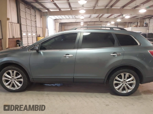 2012 Mazda CX-9 Grand Touring with VIN JM3TB3DV6C0360304, listed as a IAAI auction lot 41509627 with 163,986 mi miles. Bid and sale history available at carsss.com. Image 14.