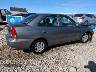 2004 Hyundai Accent GL with VIN KMHCG45C94U523529, listed as a Copart auction lot 50016085 with 188,120 mi miles and Salvage Title. Bid and sale history available at carsss.com. Image 3.