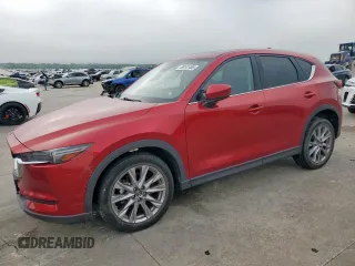 2019 Mazda CX-5 Grand Touring with VIN JM3KFADM4K1665045, listed as a Copart auction lot 58958045 with 45,524 mi miles and Salvage title. Bid and sale history available at DreamBid. Image 1.