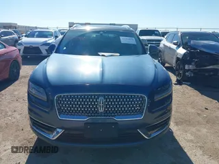 2019 Lincoln Nautilus Reserve with VIN 2LMPJ6LP3KBL51283, listed as a IAAI auction lot 41204810 with 91,184 mi miles and . Bid and sale history available at DreamBid. Image 13.
