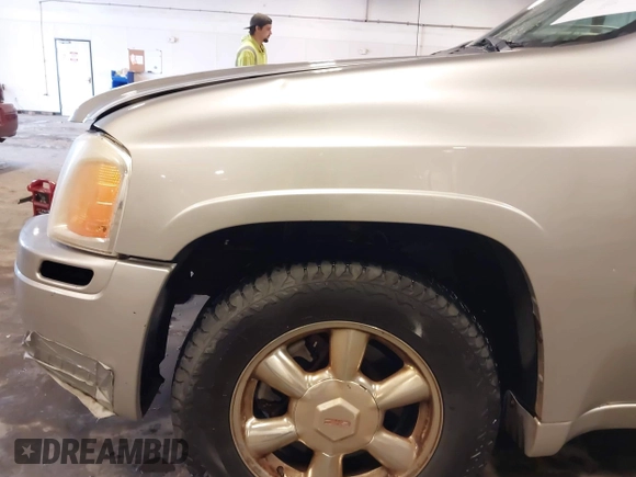 2005 GMC Envoy SLE with VIN 1GKET16S656102522, listed as a IAAI auction lot 41729310 with 233,049 mi miles. Bid and sale history available at carsss.com. Image 19.