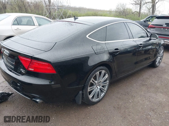 2012 Audi A7 Prestige with VIN WAUWGAFC9CN141568, listed as a IAAI auction lot 41912023 with 156,176 mi miles and . Bid and sale history available at DreamBid. Image 4.