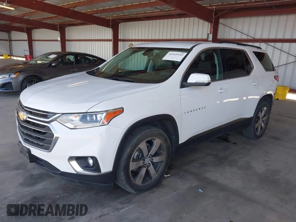 2021 Chevrolet Traverse LT with VIN 1GNERHKW8MJ232171, listed as a IAAI auction lot 42269142 with 88,830 mi miles and . Bid and sale history available at DreamBid. Image 2.