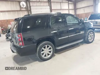 2013 GMC Yukon Denali with VIN 1GKS2EEF0DR105804, listed as a IAAI auction lot 42028402 with 121,054 mi miles. Bid and sale history available at carsss.com. Image 4.