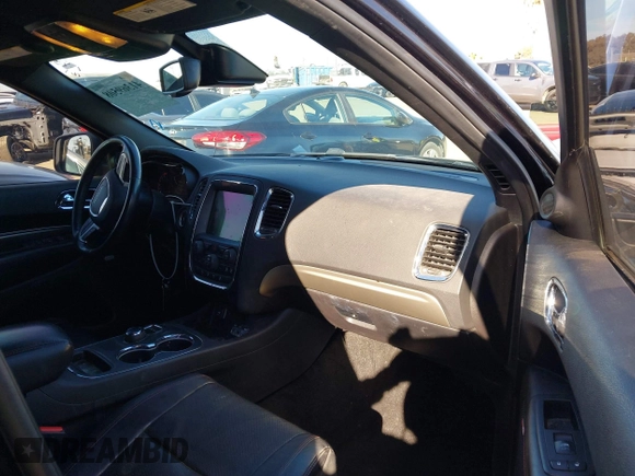 2015 Dodge Durango R/T with VIN 1C4SDHCT5FC937676, listed as a IAAI auction lot 41369508 with 107,075 mi miles and . Bid and sale history available at DreamBid. Image 5.