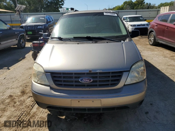 2006 Ford Freestar SE z VIN 2FMZA51696BA52749, wystawiony jako Copart lot #73174604 z przebiegiem 288 365 mil mil oraz Szkody całkowita. Historia ofert i sprzedaży dostępna na DreamBid. Obrazek 5.