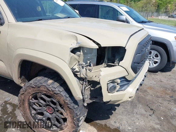 2017 Toyota Tacoma SR5 z VIN 3TMAZ5CN1HM026355, wystawiony jako IAAI lot #42060428 z przebiegiem 165 096 mil mil oraz . Historia ofert i sprzedaży dostępna na DreamBid. Obrazek 6.