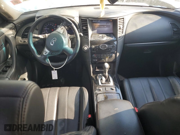 2014 Infiniti QX70 z VIN JN8CS1MW6EM413489, wystawiony jako Copart lot #87665875 z przebiegiem 139 371 mil mil oraz Czysty tytuł • Clean title. Historia ofert i sprzedaży dostępna na DreamBid. Obrazek 8.