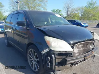 2007 Honda Odyssey EX-L with VIN 5FNRL386X7B128430, listed as a IAAI auction lot 42146089 with 231,059 mi miles and . Bid and sale history available at DreamBid. Image 12.