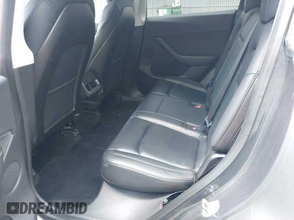 2020 Tesla Model Y Long Range with VIN 5YJYGDEE2LF029385, listed as a IAAI auction lot 42164786 with 58,685 mi miles and . Bid and sale history available at DreamBid. Image 8.