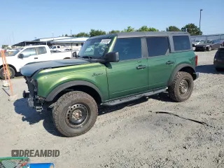 2022 Ford Bronco z VIN 1FMDE5BH4NLB10280, wystawiony jako Copart lot #62406595 z przebiegiem 87 876 mil mil oraz Szkoda całkowita • Salvage title. Historia ofert i sprzedaży dostępna na DreamBid. Obrazek 1.