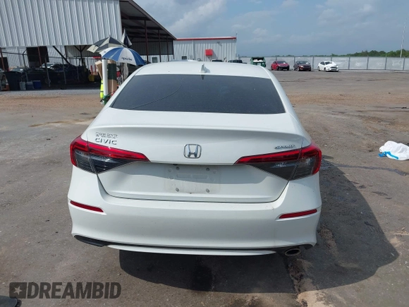 2023 Honda Civic Sport z VIN 2HGFE2F52PH551676, wystawiony jako IAAI lot #42099012 z przebiegiem 37 760 mil mil oraz . Historia ofert i sprzedaży dostępna na DreamBid. Obrazek 16.