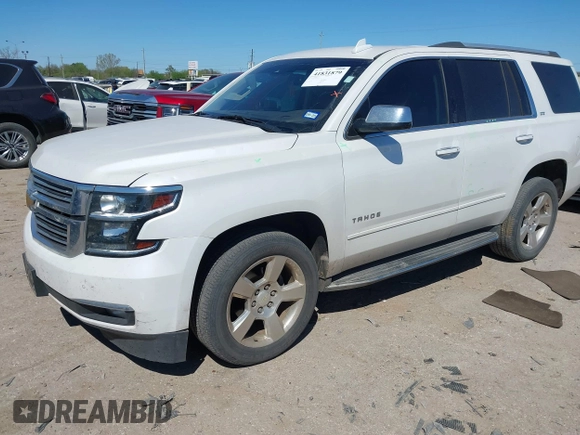 2016 Chevrolet Tahoe LTZ with VIN 1GNSCCKC1GR404754, listed as a IAAI auction lot 41831879 with 139,681 mi miles and . Bid and sale history available at DreamBid. Image 17.