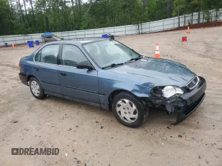 1997 Honda Civic LX z VIN 2HGEJ6676VH507855, wystawiony jako Copart lot #56684455 z przebiegiem 185 498 mil mil oraz Szkoda całkowita • Salvage title. Historia ofert i sprzedaży dostępna na DreamBid. Obrazek 4.