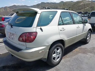 2000 Lexus RX 300 with VIN JT6GF10U6Y0058395, listed as a IAAI auction lot 41910303 with 203,392 mi miles. Bid and sale history available at carsss.com. Image 4.