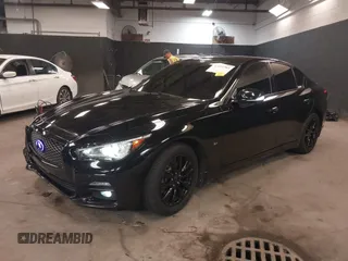 2014 Infiniti Q50 Sport with VIN JN1BV7AR0EM704993, listed as a IAAI auction lot 42492764 with 64,811 mi miles and . Bid and sale history available at DreamBid. Image 2.