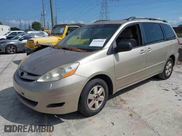 2009 Toyota Sienna CE with VIN 5TDZK23C09S251520, listed as a IAAI auction lot 42155604 with 233,153 mi miles. Bid and sale history available at carsss.com. Image 2.