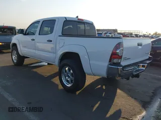 2014 Toyota Tacoma PreRunner with VIN 3TMJU4GN3EM160587, listed as a IAAI auction lot 42710985 with 200,867 mi miles and . Bid and sale history available at DreamBid. Image 3.