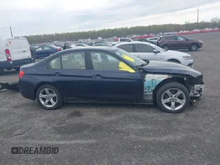 2015 BMW 3 Series 320i xDrive with VIN WBA3C3G5XFNT51305, listed as a IAAI auction lot 42023280 with 127,887 mi miles and . Bid and sale history available at DreamBid. Image 14.