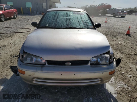 1996 Geo Prizm z VIN 1Y1SK5267TZ068437, wystawiony jako Copart lot #41403285 z przebiegiem 74 727 mil mil oraz Szkody całkowita. Historia ofert i sprzedaży dostępna na DreamBid. Obrazek 5.