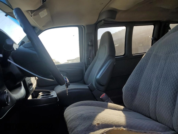 2009 Chevrolet Express Passenger with VIN 1GAHG35K091166089, listed as a Copart auction lot 76703124 with 184,354 mi miles and Clean title. Bid and sale history available at DreamBid. Image 7.