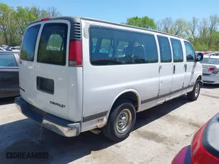 2002 Chevrolet Express Van with VIN 1GAHG39R721197305, listed as a IAAI auction lot 42041685 with 119,605 mi miles. Bid and sale history available at carsss.com. Image 4.
