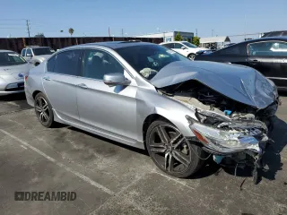 2017 Honda Accord Touring with VIN 1HGCR3F91HA016581, listed as a Copart auction lot 60517085 with 99,182 mi miles and Salvage title. Bid and sale history available at DreamBid. Image 4.
