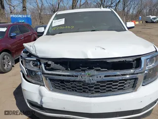 2016 Chevrolet Suburban LT with VIN 1GNSKHKC9GR410334, listed as a IAAI auction lot 41770867 with 168,257 mi miles. Bid and sale history available at carsss.com. Image 13.