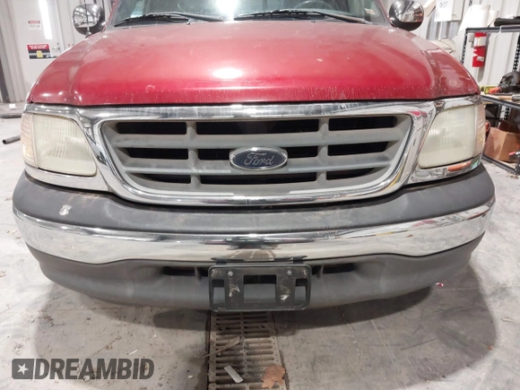 2002 Ford F-150 XL with VIN 1FTRX17L12NA36715, listed as a IAAI auction lot 41850555 with 174,012 mi miles. Bid and sale history available at carsss.com. Image 6.