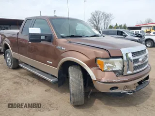 2011 Ford F-150 XL with VIN 1FTFX1ET9BKD67310, listed as a IAAI auction lot 42016119 with 147,114 mi miles. Bid and sale history available at carsss.com. Image 1.