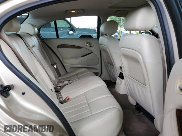 2003 Jaguar S-Type z VIN SAJEA01U53HM58399, wystawiony jako Copart lot #62006044 z przebiegiem 86 841 mil mil oraz Szkoda całkowita • Salvage title. Historia ofert i sprzedaży dostępna na DreamBid. Obrazek 10.