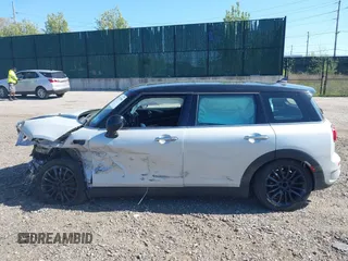 2019 MINI Clubman Cooper S z VIN WMWLN9C57K2H60248, wystawiony jako IAAI lot #42111586 z przebiegiem 46 882 mil mil oraz . Historia ofert i sprzedaży dostępna na DreamBid. Obrazek 13.